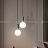 Серия подвесных светильников со стеклянным шарообразным плафоном и декором из натурального мрамора PETIT A фото 14